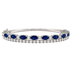 „ADA Jewelry“ Armreif mit ovalen blauen Saphiren, 8,80 Karat, ausschließlich Natursteine