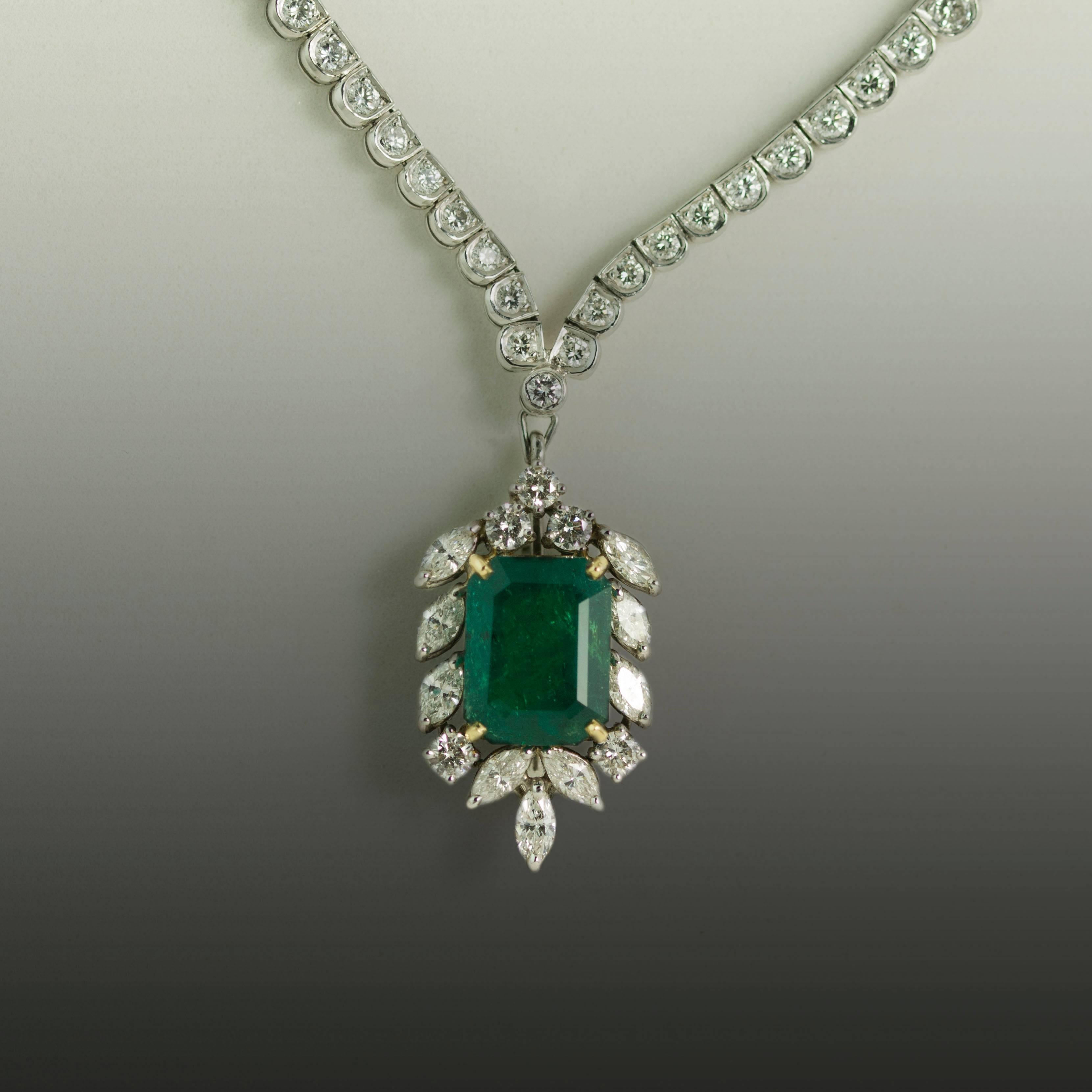 Platinum Necklace circa 1950's with one "detachable" Colombian Emerald weighing approximately 5.60 carats and marquis cut and round diamonds weighing approximately 7.50 carats.