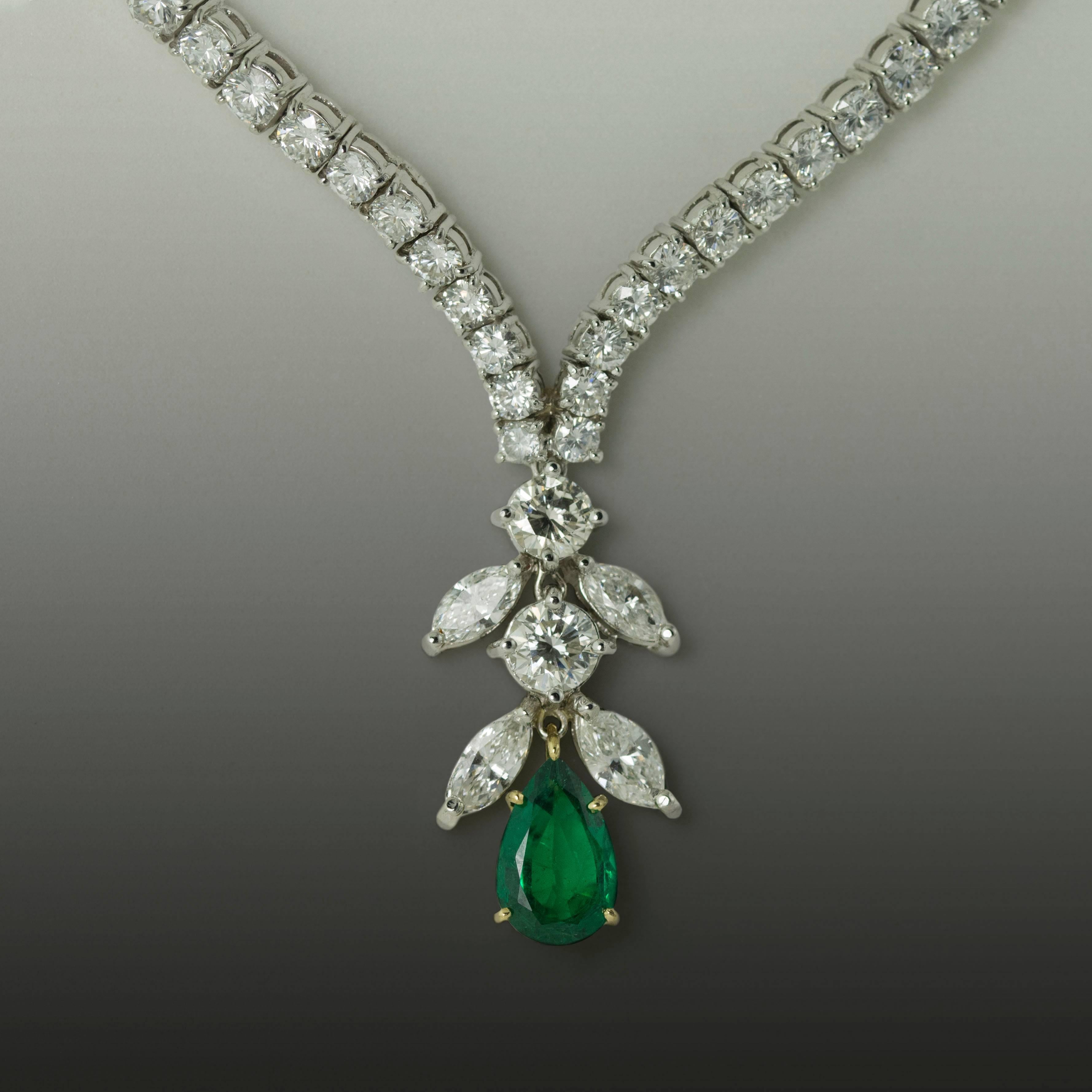 Platinum Necklace with one pear shape emerald weighing approximately 2.00 carats and approximately 19.00 carats of fine round brilliant and marquis cut diamonds. 18"
 
