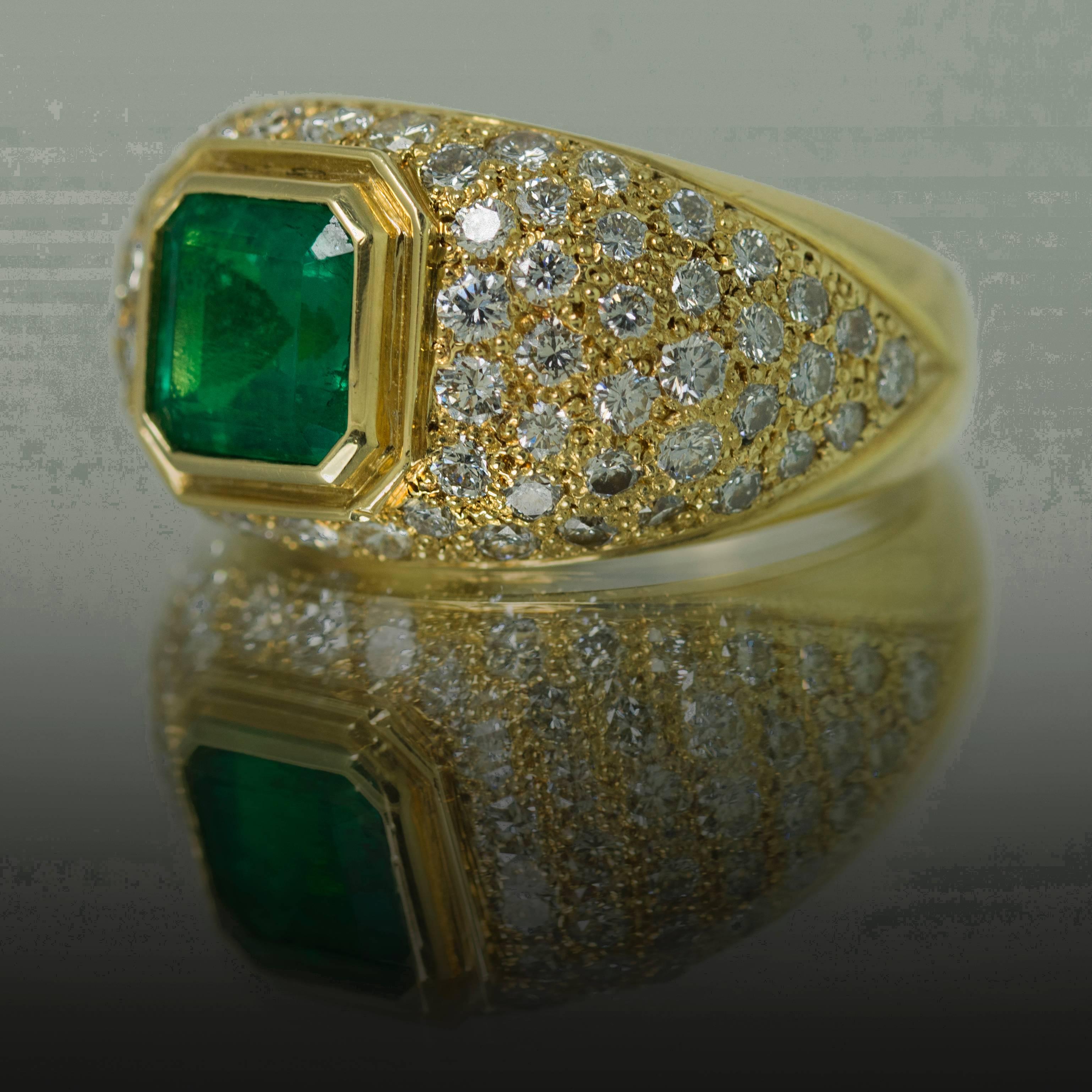 Beautiful 18k gold Ring with 1 Emerald Weighing 1.65 Carats and 74 Round Diamonds Weighing 2.76 Carats. We Offer Complementary Sizing with Each Purchase. 