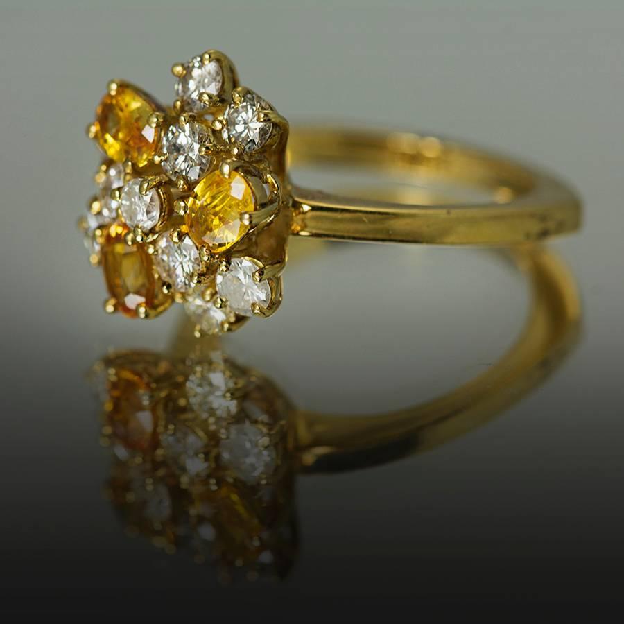 18K Ring with 3 Yellow Sapphires Weighing 1.27 Carats and 10 Diamonds Weighing 1.19 Carats. 