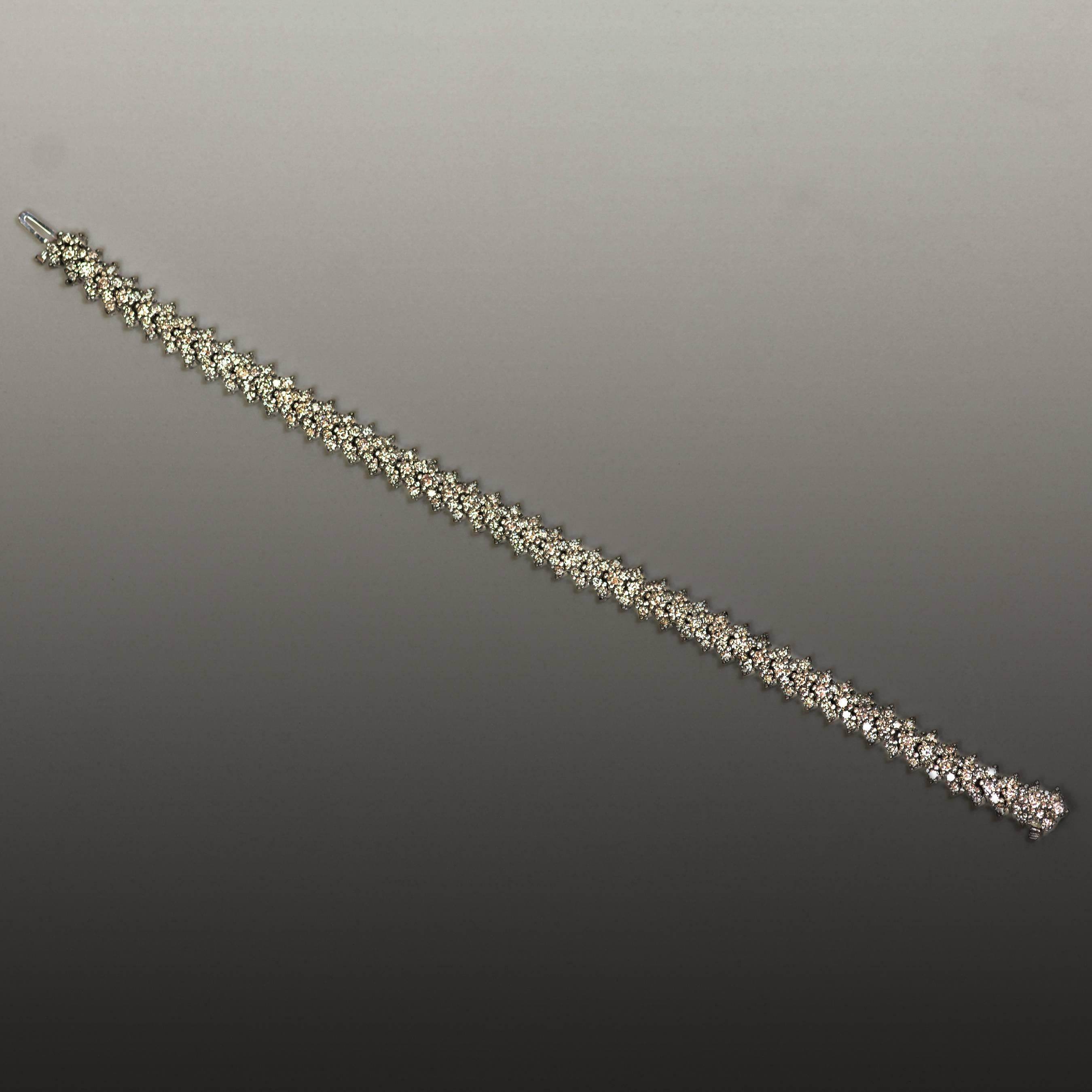 14k White gold bracelet with 245 round brilliant diamonds weighing approximately 5.50 carats. 7"