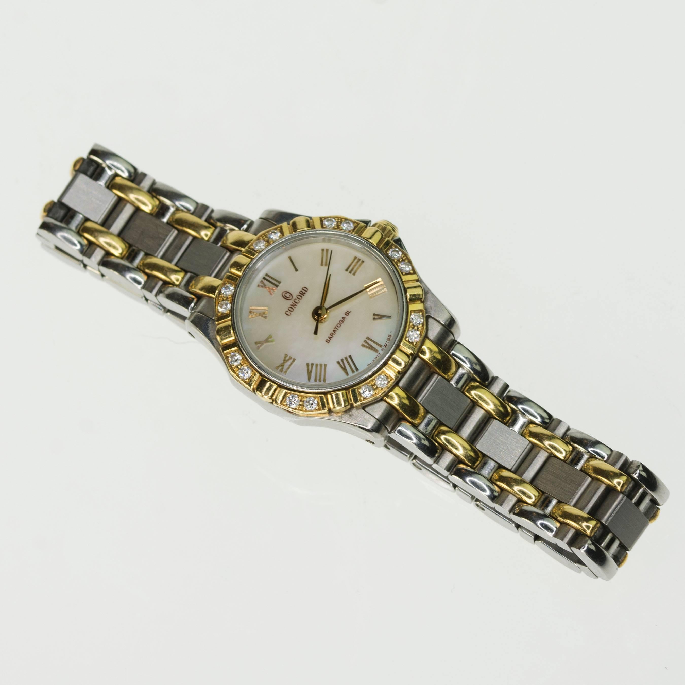 Ladies SS/18k Concord Saratoga SL with mother of pearl dial and diamond bezel