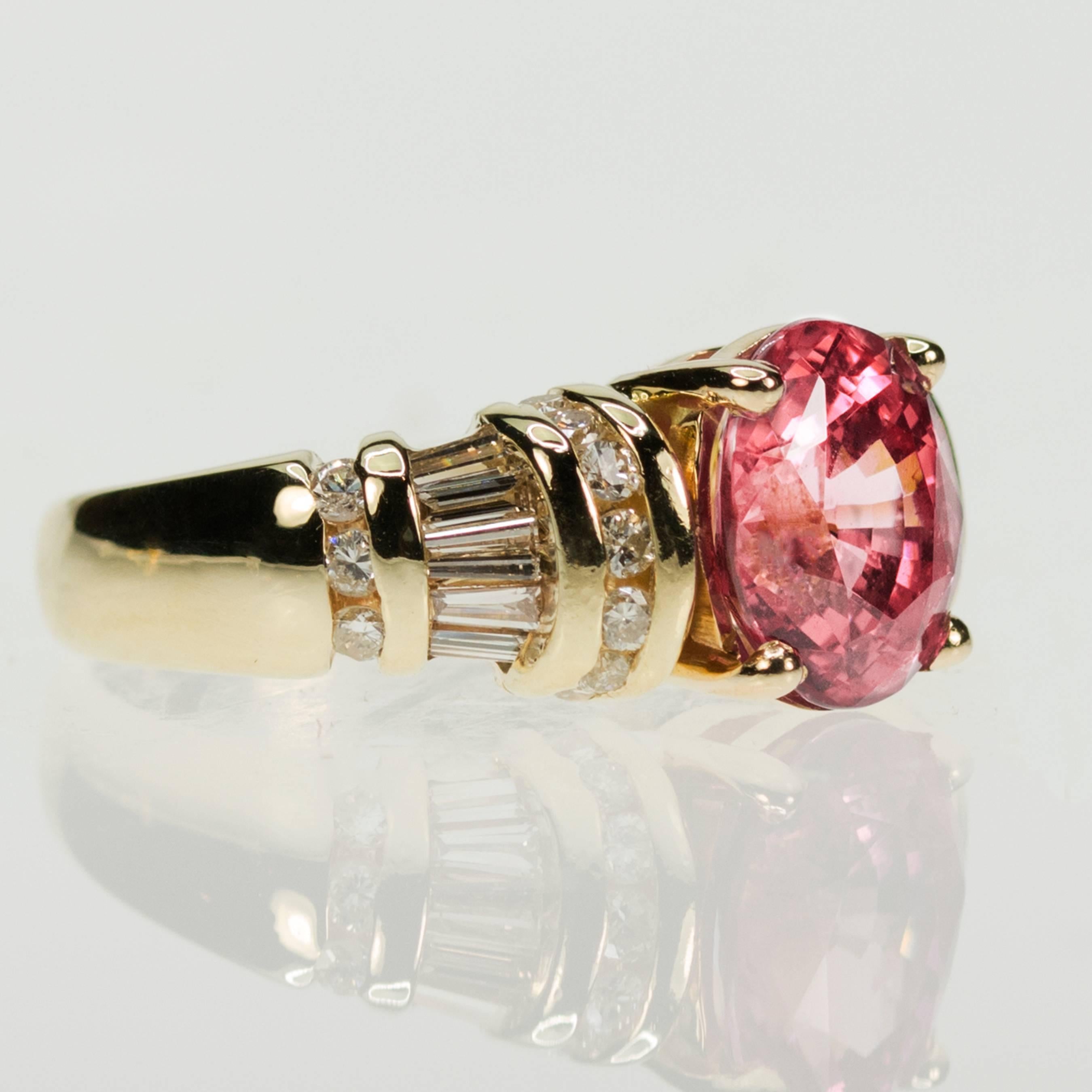 Yellow Gold Ring with AGL certified 3.01 carat Ceylon pink sapphire and approximately 0.75 carats of round brilliant and baguette diamonds..