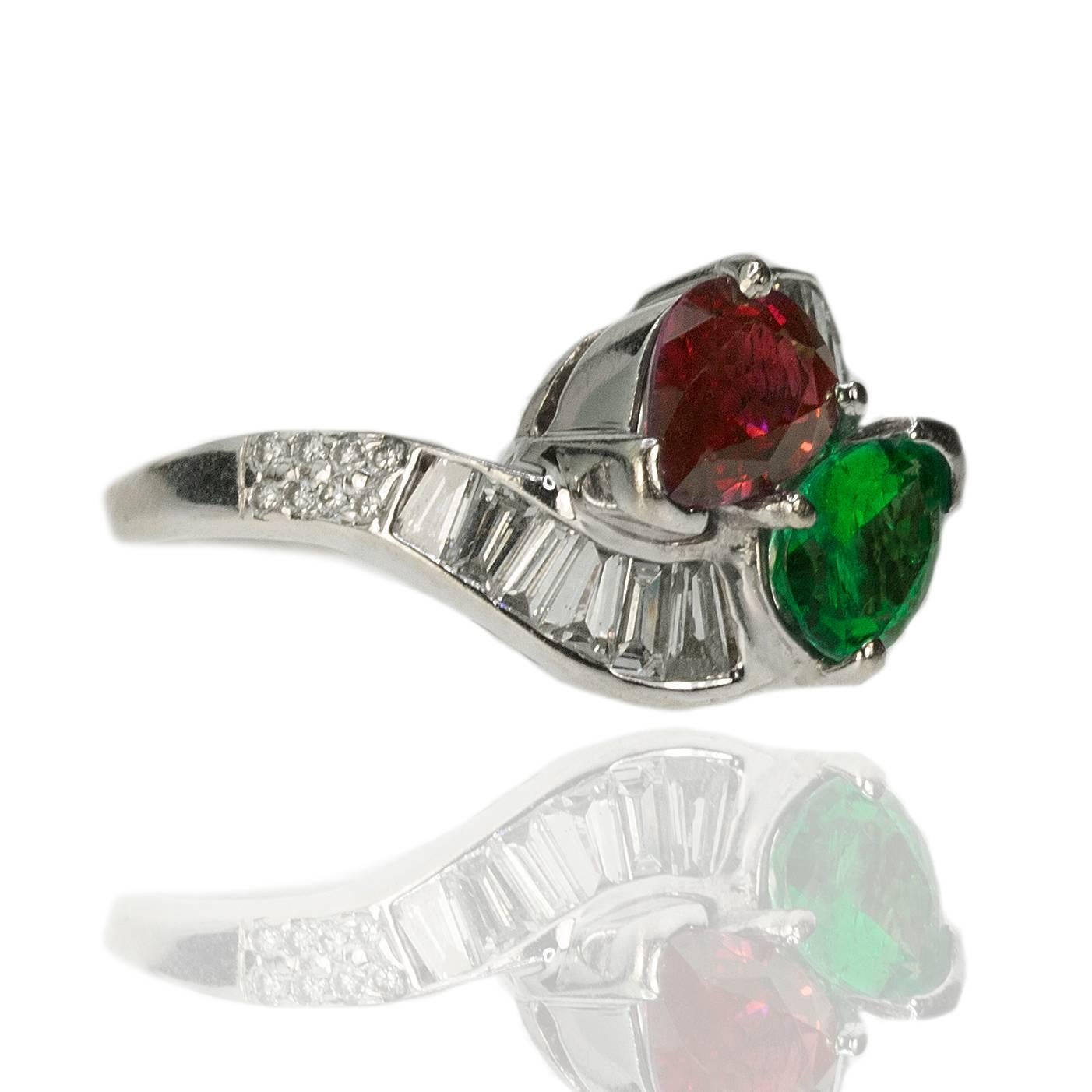 14k Bypass Ring, Burma Ruby weighing 1.32 carats, Colombian Emerald weighing 0.92 carats and 16 round brilliants weighing approximately 0.24 carats and 12 tapered baguettes weighing apprximately 0.60 carats, 6.05g