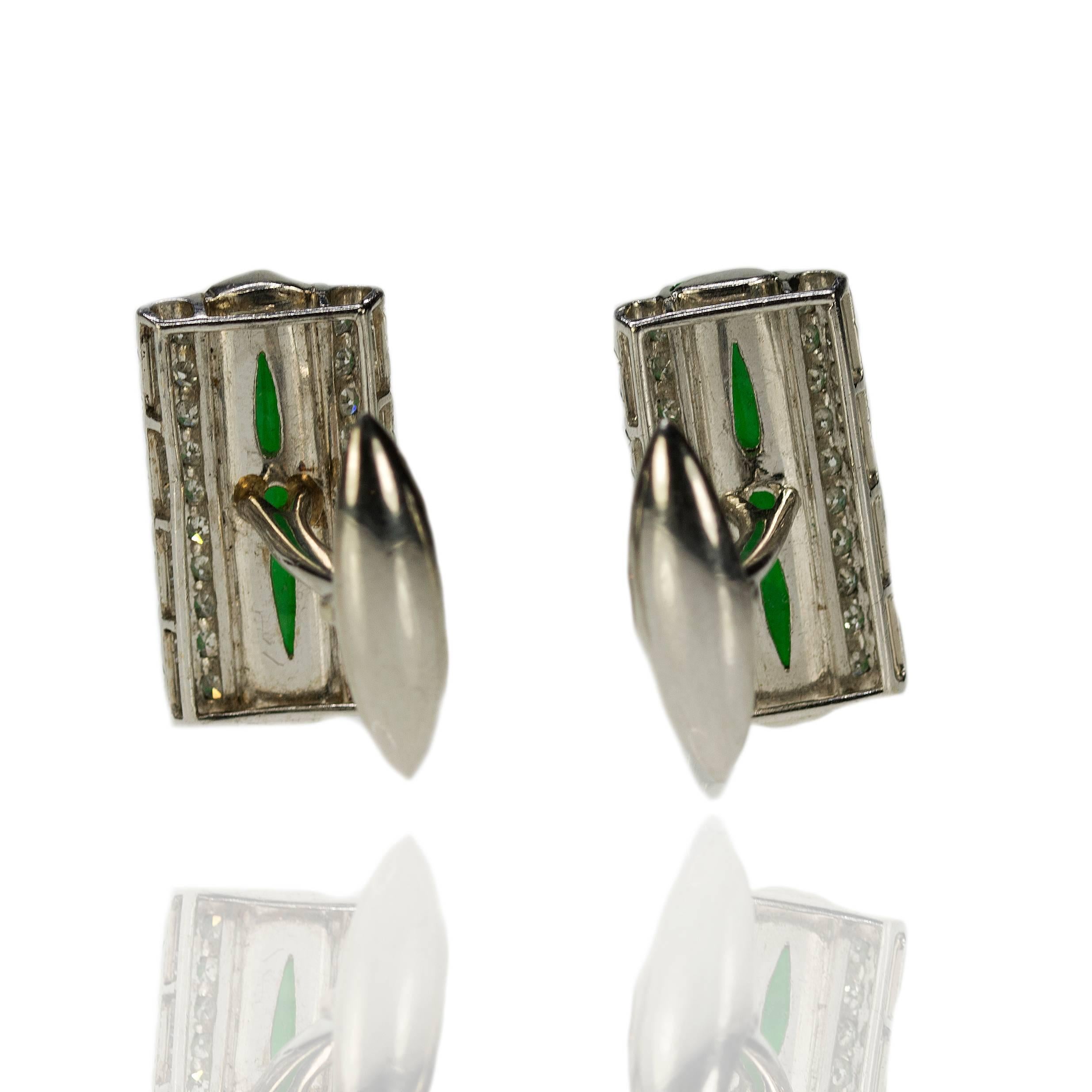 Platinum Imperial Jade Cufflinks 2 GIA certified Jade cabochons weighing approximately 12.00 carats and approximately 1.00 carats of modern round brilliant diamonds, 18.03g