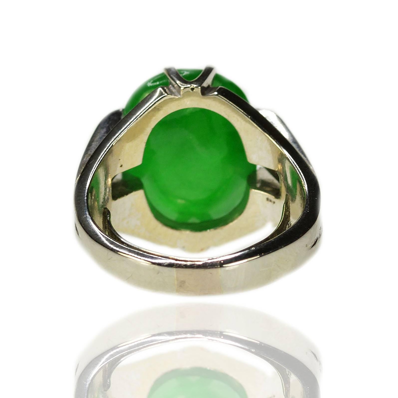 Platinum Ring  with one GIA certified no treatment Jadeite Jade weighing approximately 10.30 carats and approximately 0.20 carats of fine diamonds, 10.56g