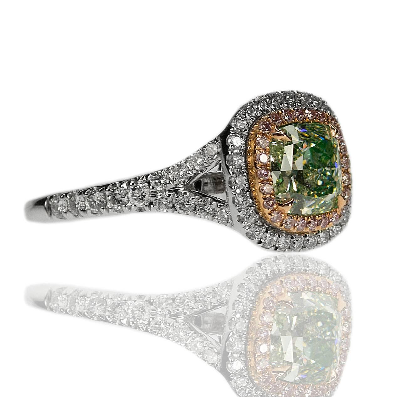 18k Ring with GIA cerified Natural Light Fancy Grayish, Yellowish Green VS1 Radiiant Cut DIamond weighing 1.22 carats and twenty natural pink diamonds weighing 0.15 carats as well as fifty two white round brilliant diamonds weighing 0.36 carats,