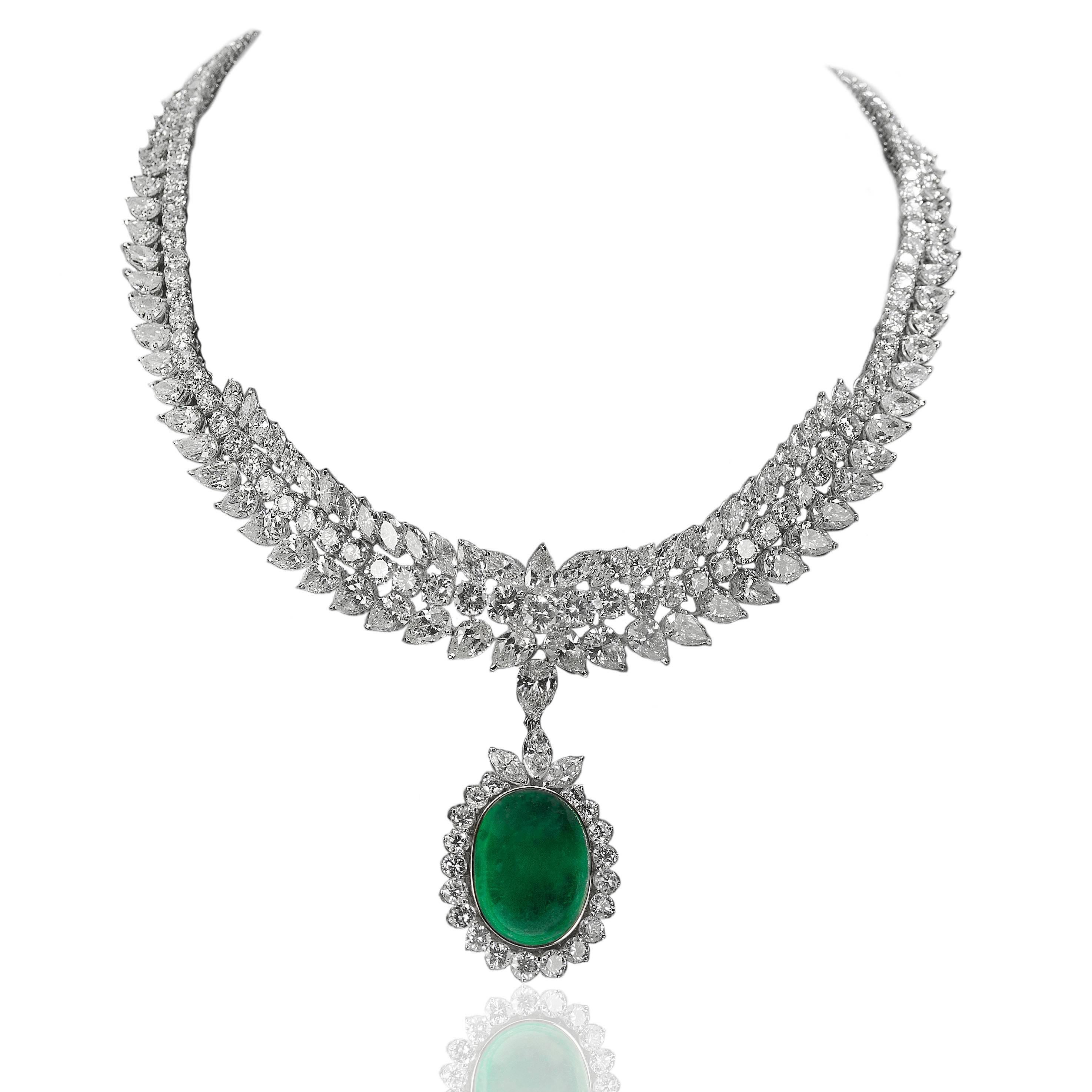 Platinum & 18k Pendant with AGL certified 34.46 carat Colombian Emerald and 5.56 carats of colorless round brilliant and pear shape diamonds. 17.71g