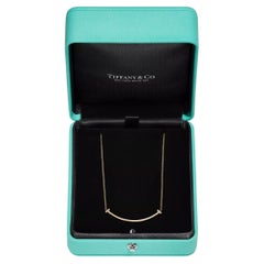 Collana piccola Tiffany T Smile in oro 18 carati con diamanti