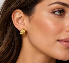 Boucles d'oreilles manchette en or jaune 18 carats