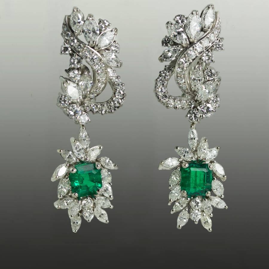 Platinum Diamond cluster Earrings with detachable emerald drops. Contains two GIA certified Colombian emeralds weighing 2.66 carats and approximately 10 carats of marquis and round brilliant diamonds.