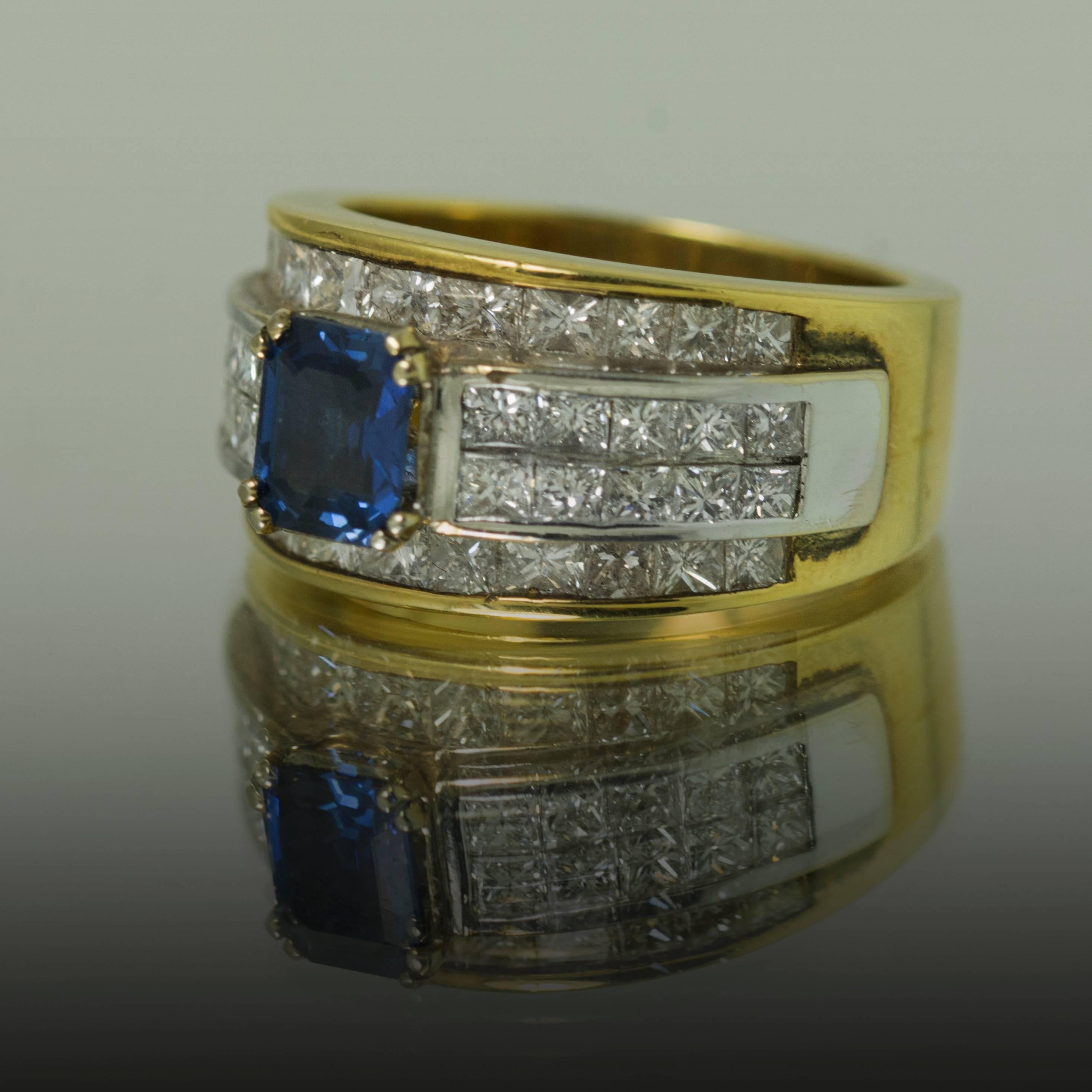 14k Ring with 1 Square cut sapphire weighing 1.05 carats and 30 invisibly set princess cut diamonds weighing 3.06 carats. Size 7