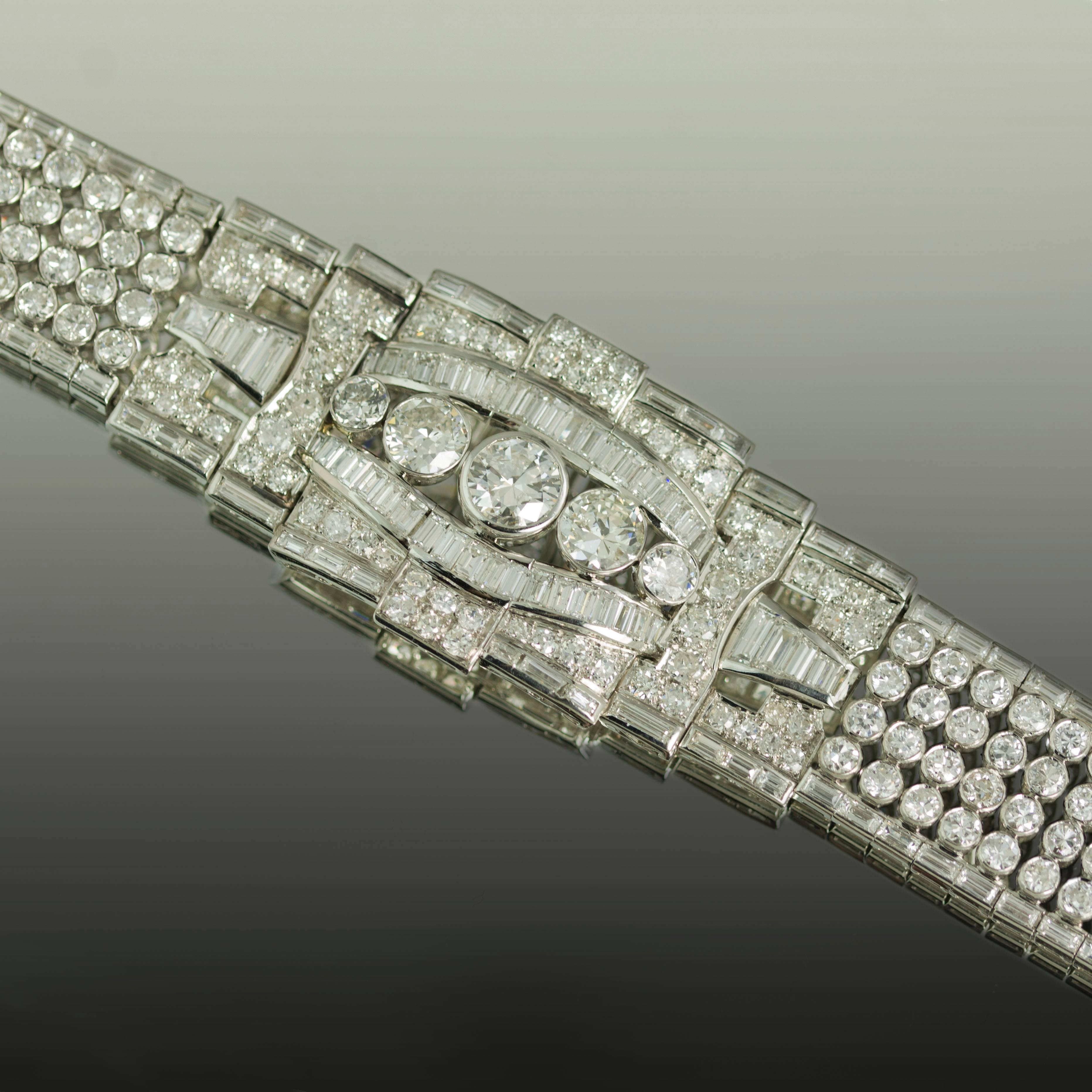 Platinum Art Deco Bracelet Circa 1940's with approximately 34 carats of old european and transitional cut diamonds. 7"