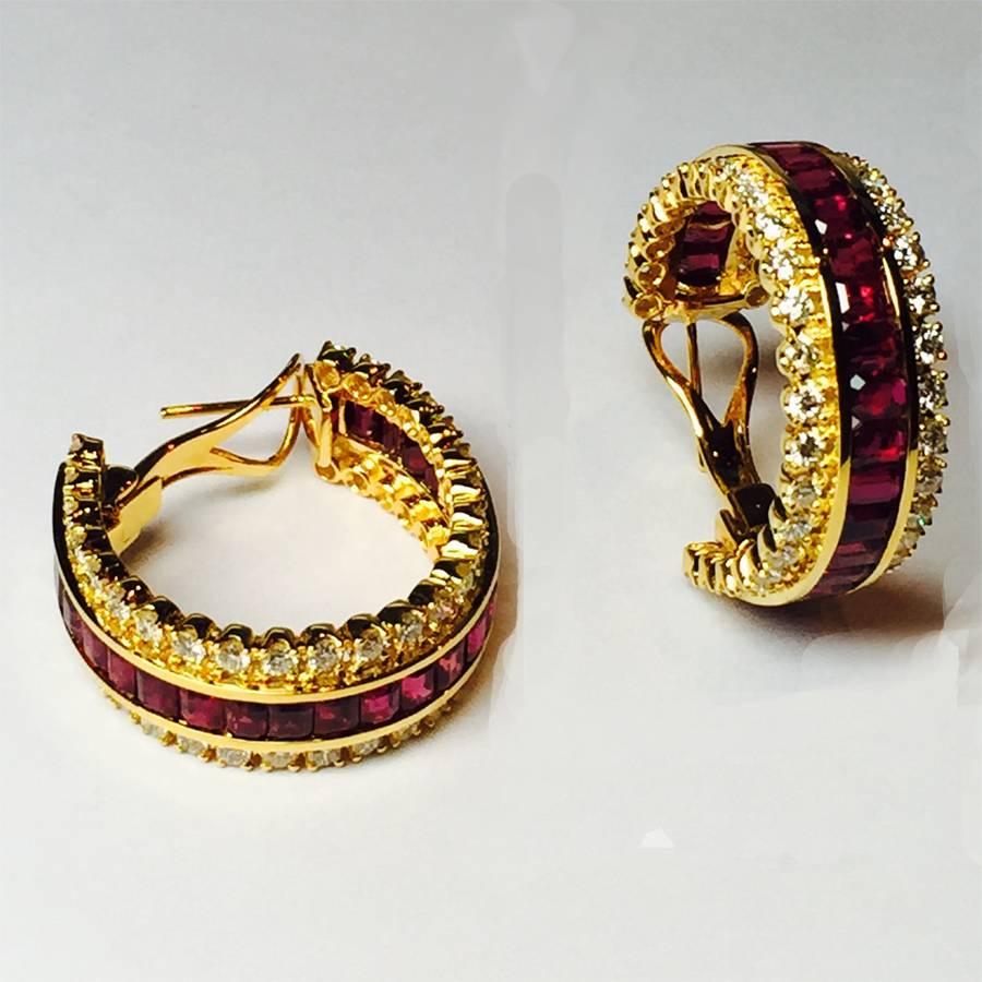 18k Hoop Style Earrings with 50 Square Cut Natural Rubies weighing 11.69 carats and 96 Round Brilliant Diamonds weighing 3.07 carats.
