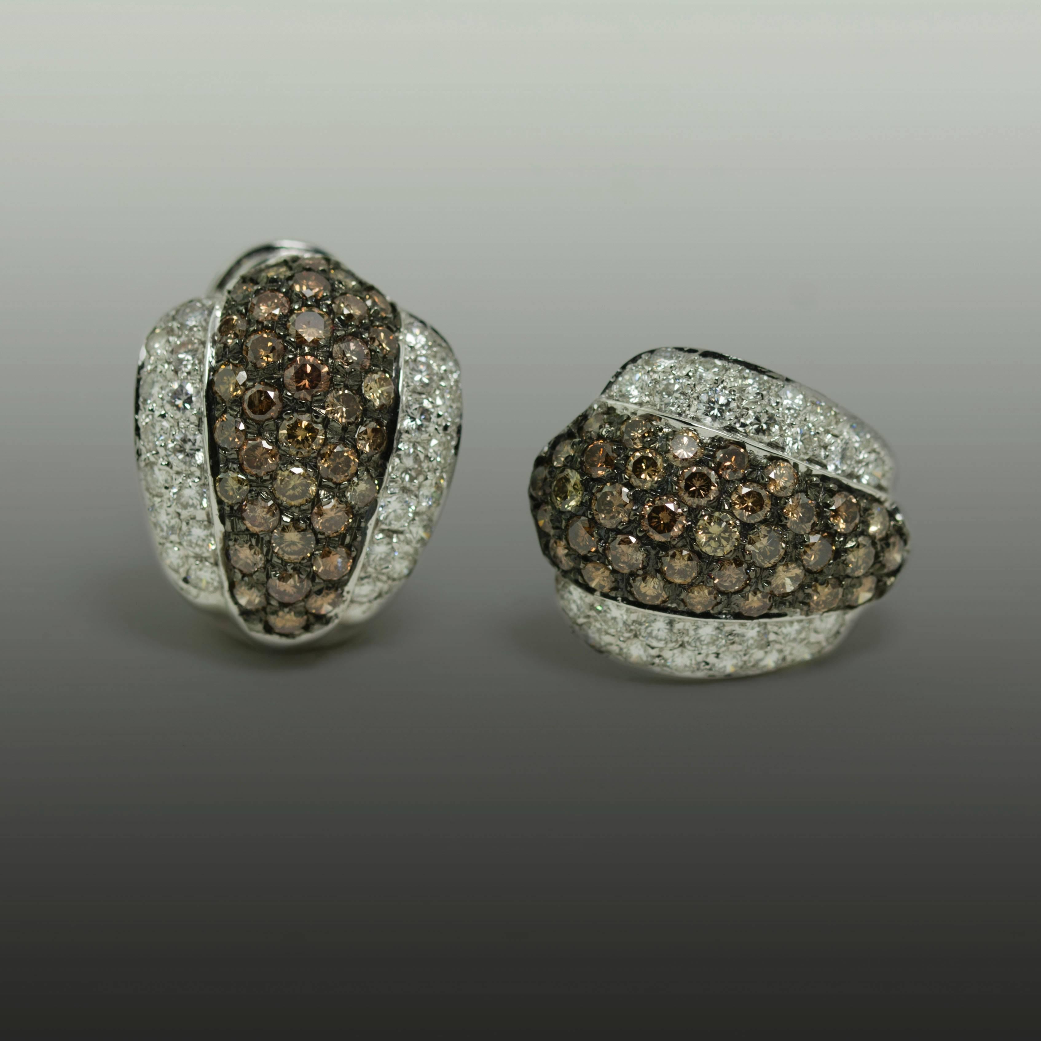 Platinum Earrings with 4.20 carats of pave set chocolate diamonds and 1.56 carats of fine white diamonds, French hallmarks.
