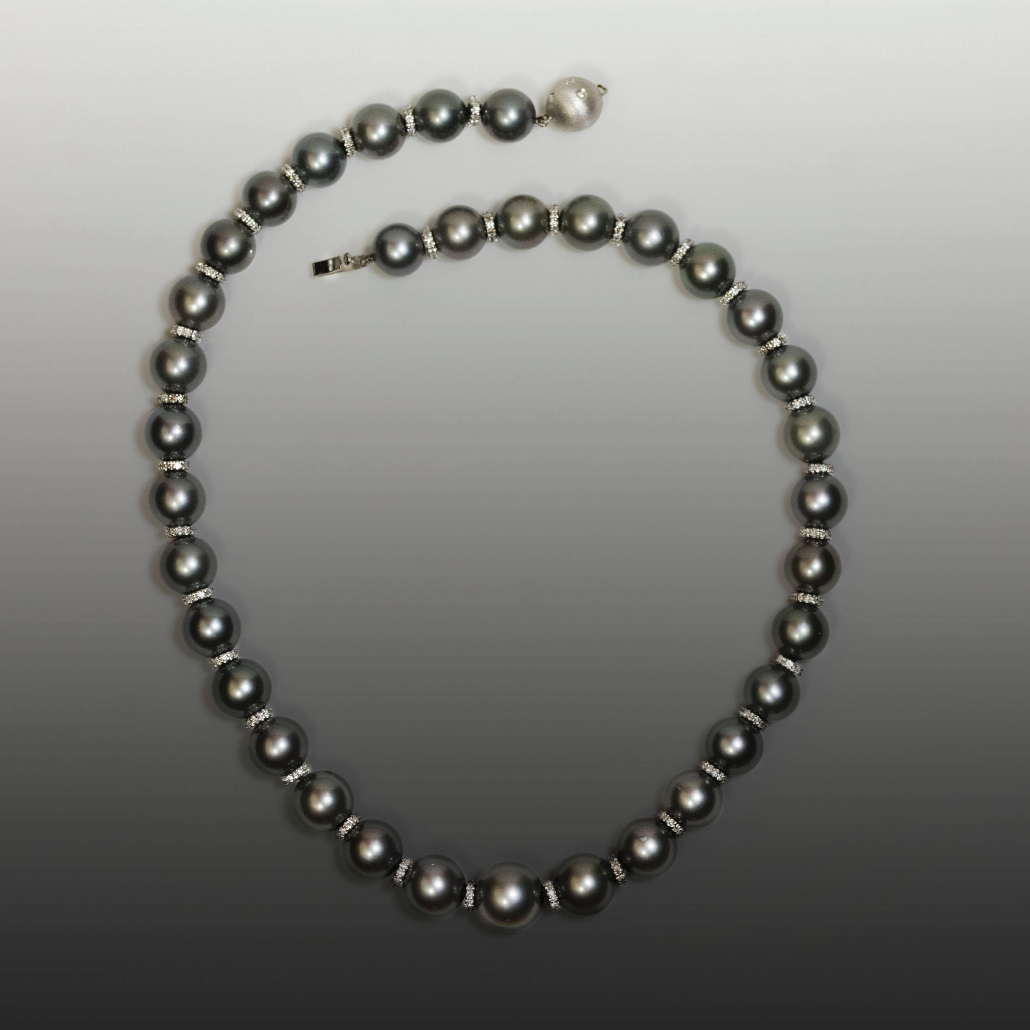 18k Necklace with 35 fine Tahitian Pearls graduating from 10mm to 13mm and separated by pave diamond rondel containing 2.15 carats of round brilliant diamonds.