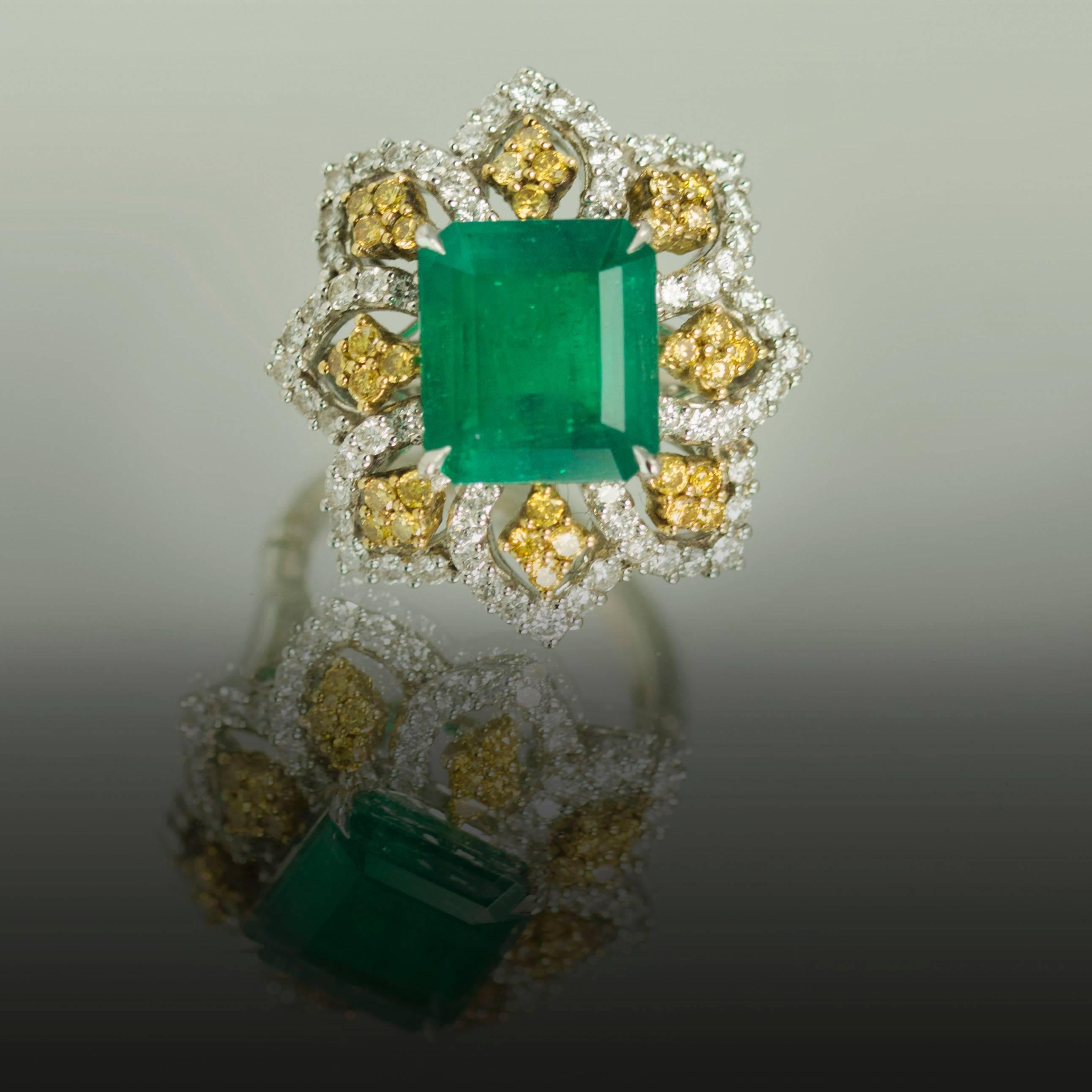 Modern Emerald Yellow Diamond Platinum Ring For Sale