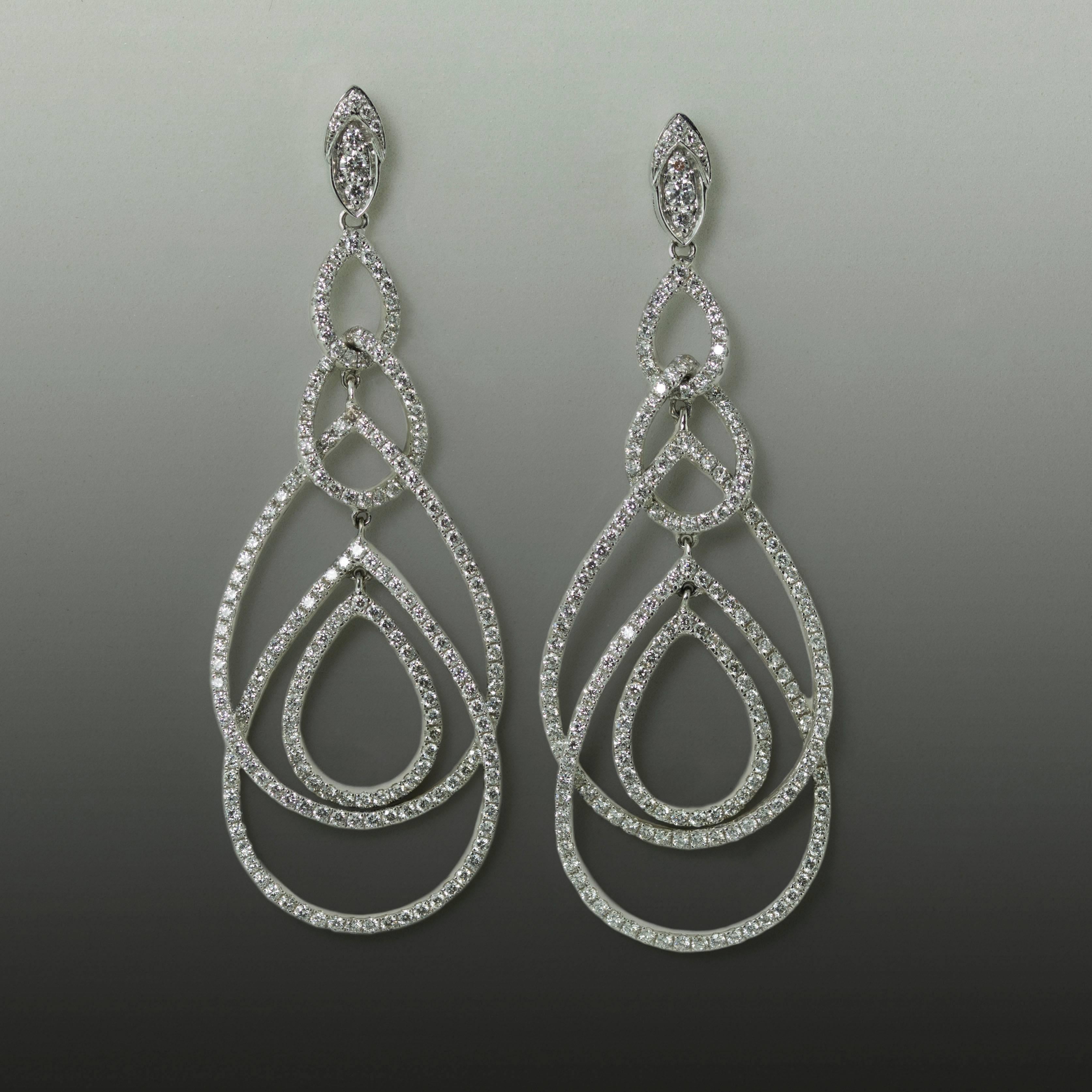 Lovely 18K White Gold Chandelier Earrings With 238 Round Brilliant Diamonds Weighing 5.08 Carats. 