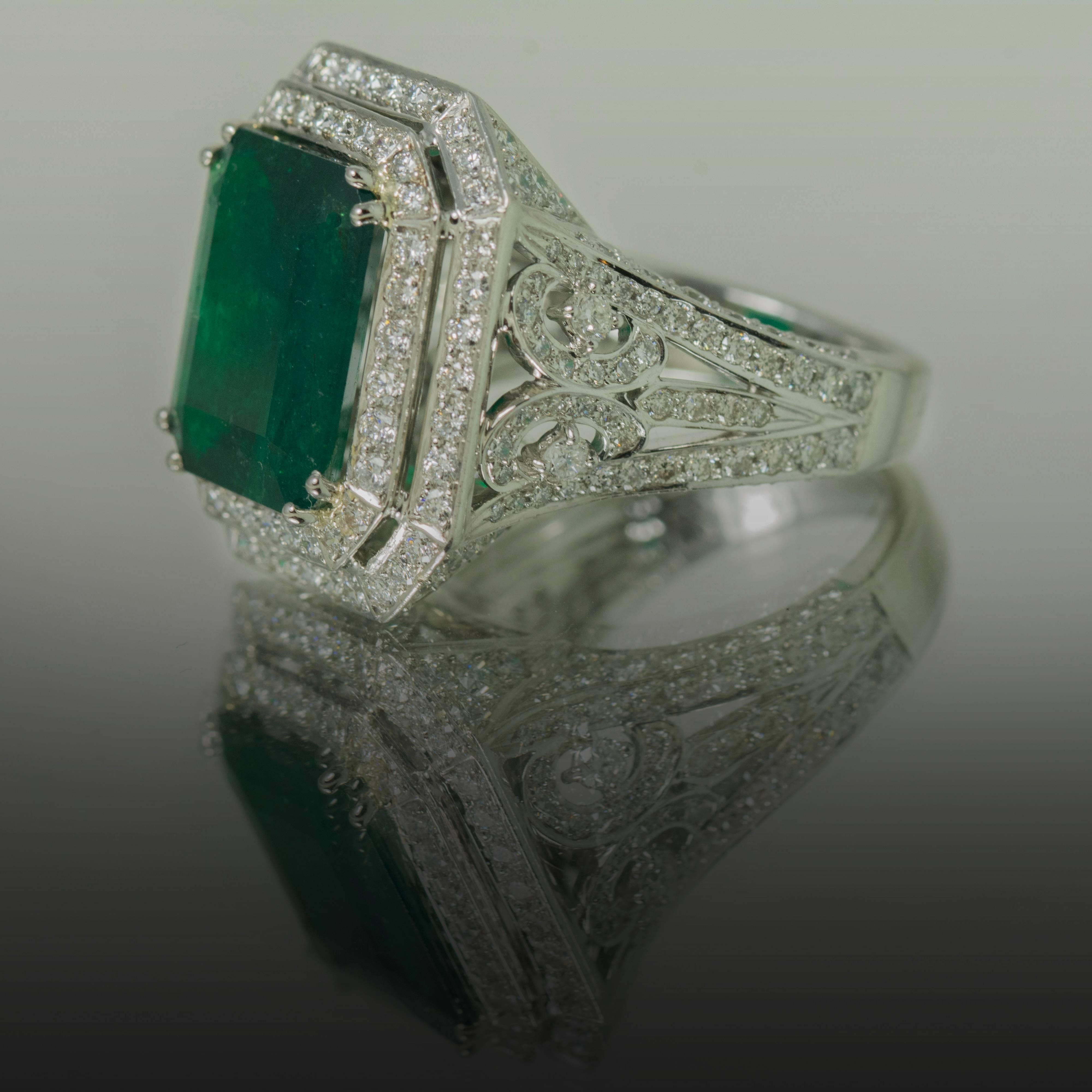 Platinum Ring with 1 Emerald Weighing 6.81 Carats along with 4.71 Carats of Diamonds. Emerald is Gubelin and C. Dunaigre Certified. We Offer Complementary Sizing with every Purchase.  