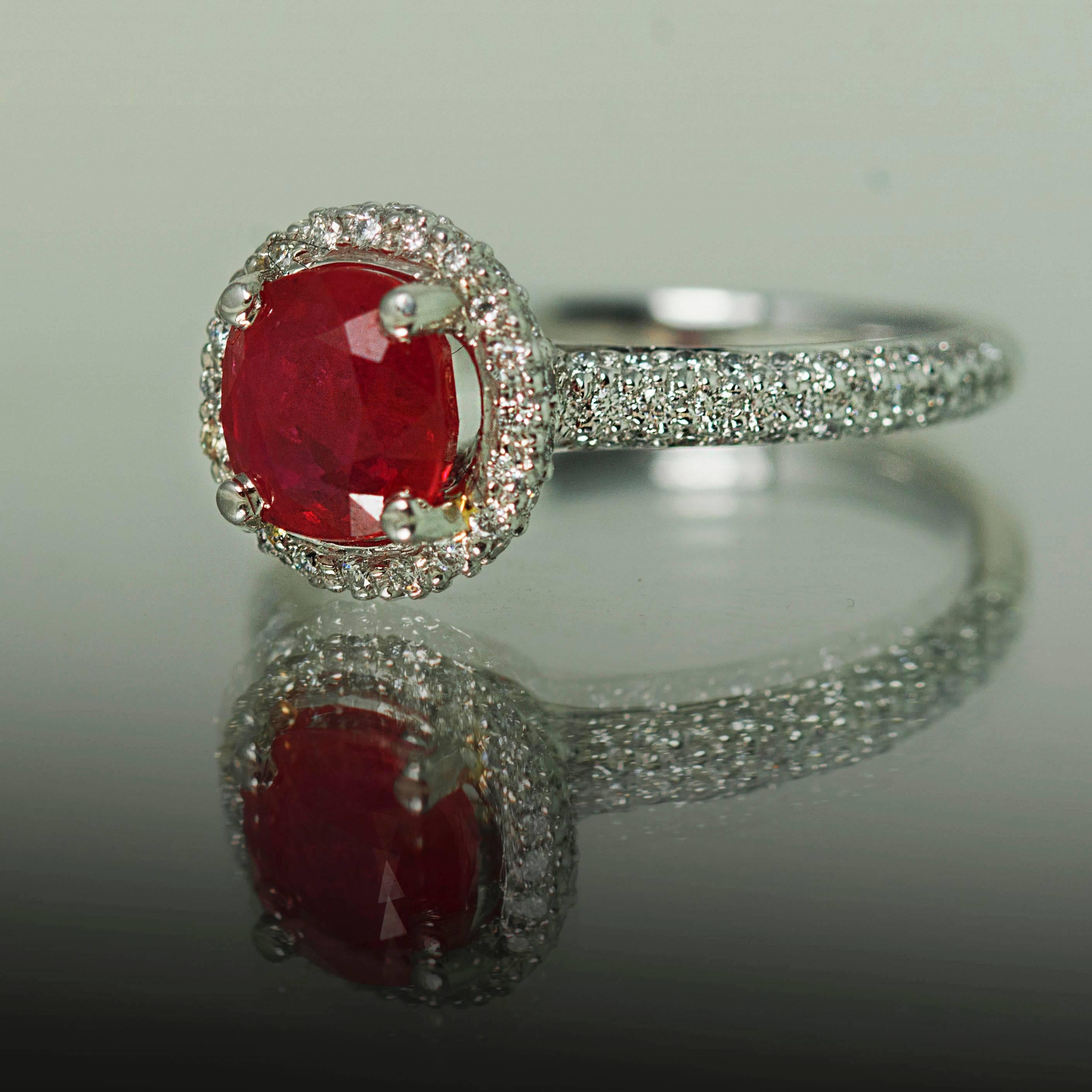 18K Ring with 1 Burma Ruby Weighing 1.81 Carats and 122 Diamonds Weighing 0.45 Carats. 
