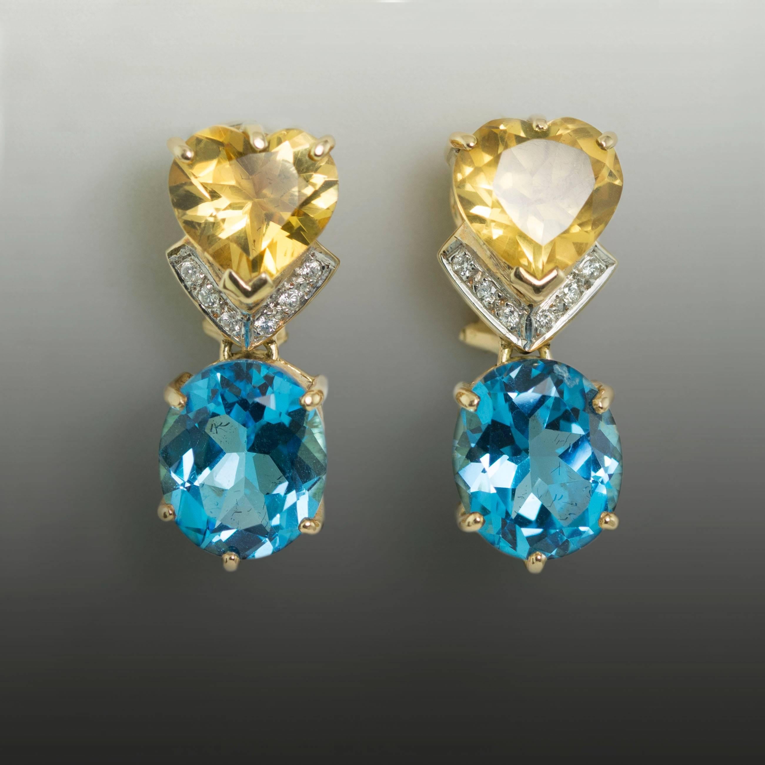 14K Earrings with 2 Oval Blue Topaz Weighing 11.40 Carats and 2 Heart Shape Citrine Weighing 5.30 Carats and Diamonds Weighing 0.18 Carats.