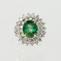 Anello d'oro con doppio diamante e tormalina Halo