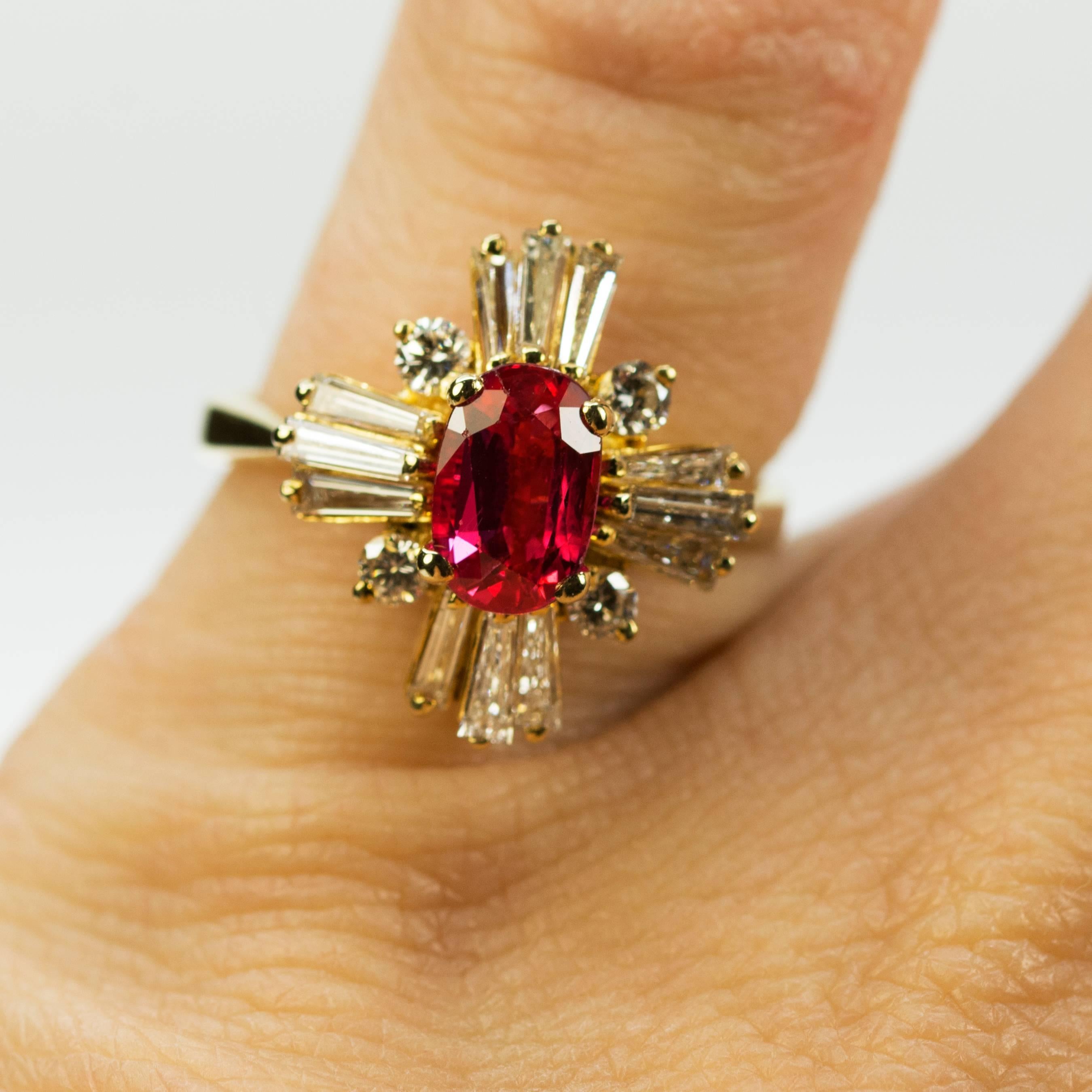 18k Ring with GIA certified 1.32 carat ruby and baguette cut and round diamonds weighing approximately 1.00 carats. 5.62g