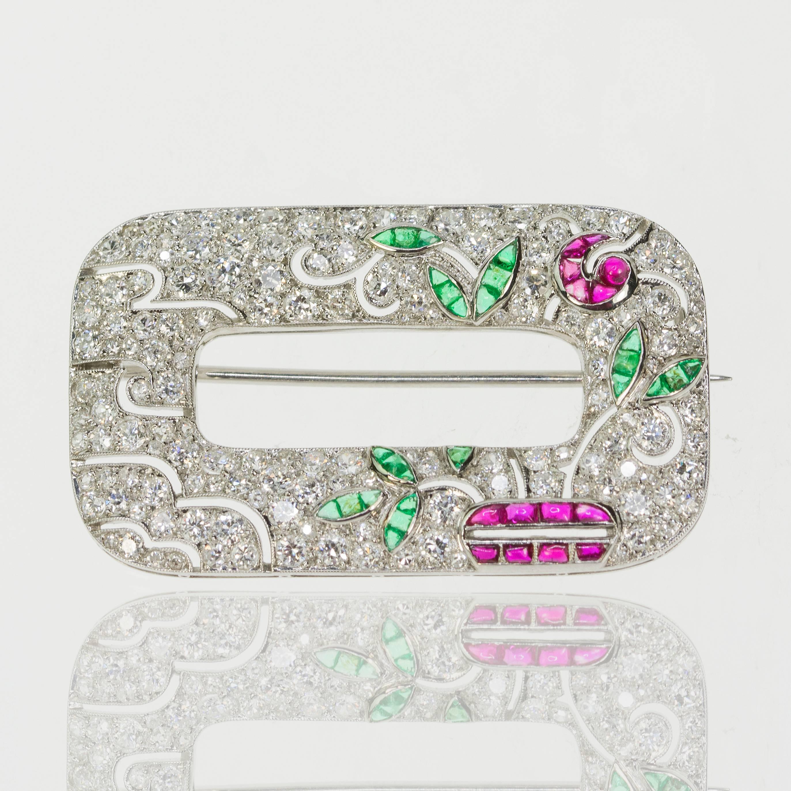 Platinum Art Deco Brooch with approximately 6 carats of fine diamonds, rubies & emeralds 