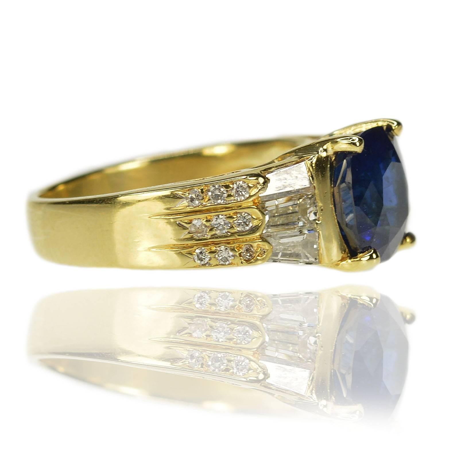 18k Ring with AGL certified 3.05 carat Ceylon Sapphire and 1.02 carats of tapered baguette and round brilliant diamonds. 6.04g