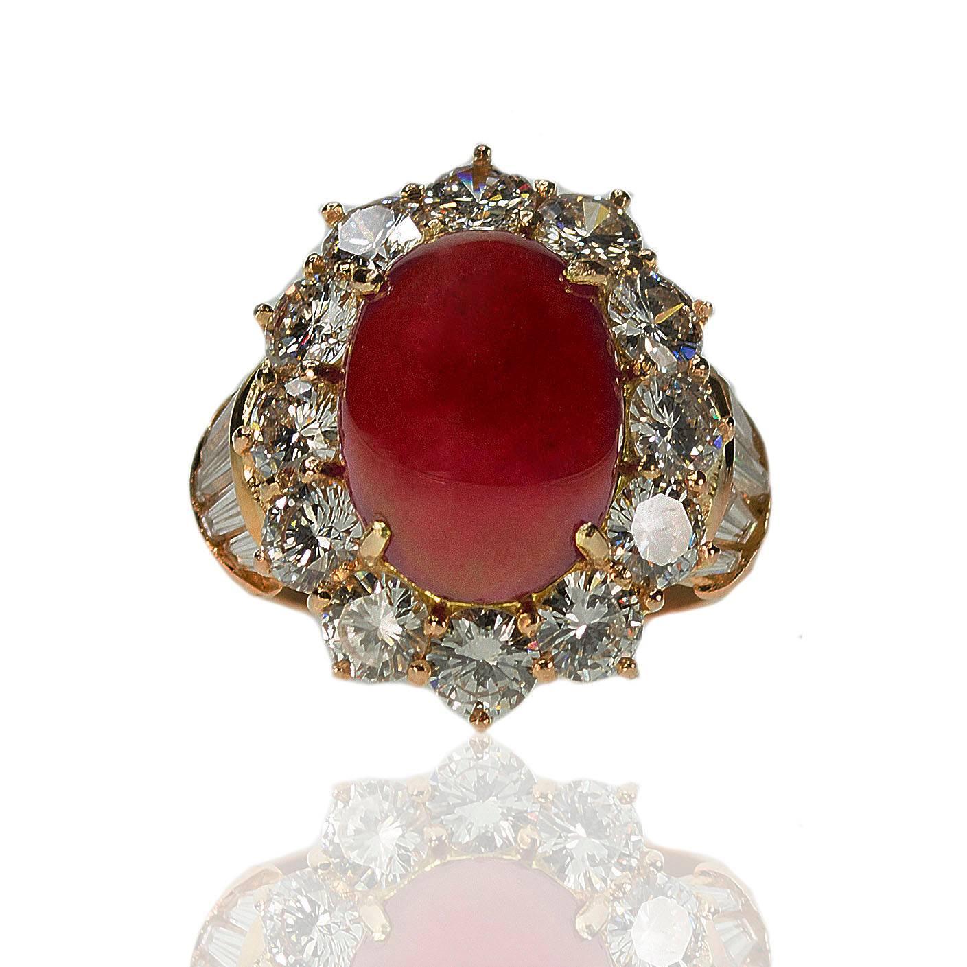 AGL certified 7.98 carat cabochon Burma Ruby set in 18k mounting with 18 round brilliant and 10 tapered baguette diamonds weighing 5.11 carats, 9.89g