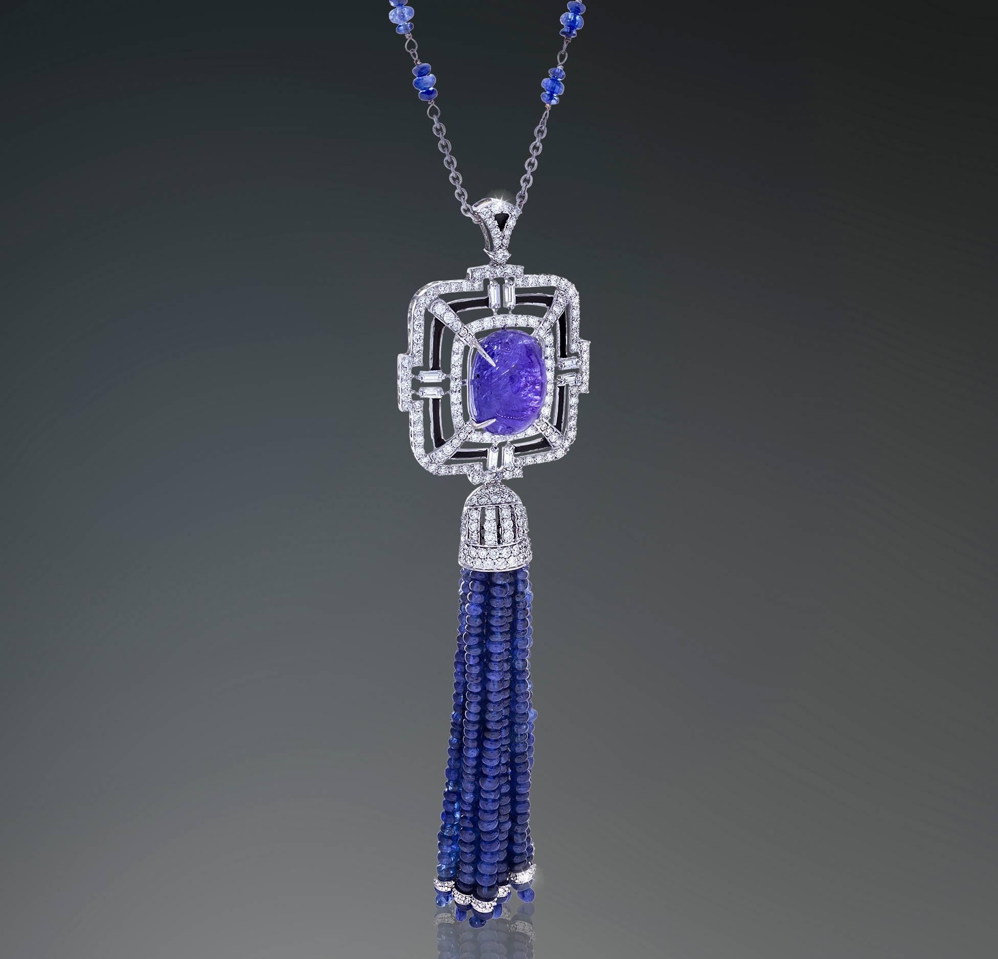 18K Tassle Necklace with one Tanzanites weighing 10.30 carats, faceted Sapphire beads weighing  70.00 carats, White Diamonds 1.86 carats and Black Diamonds weighing 0.28 carats.