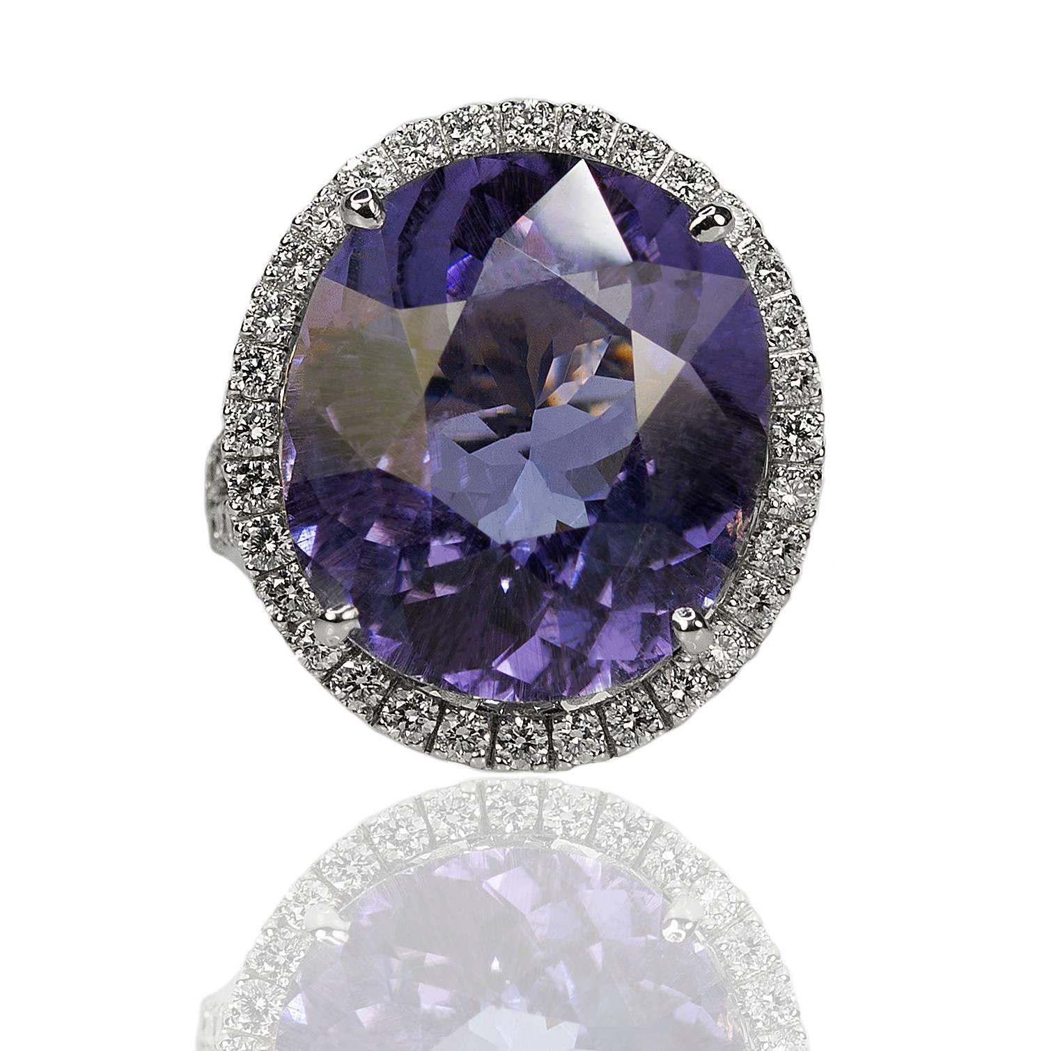 18k White Gold Ring with one AGL certified 17.72 carat Lavender Cuprian ( Paraiba Type ) Tourmaline  and 62 round brilliant diamonds weighing 1.71 carats, 12.62g