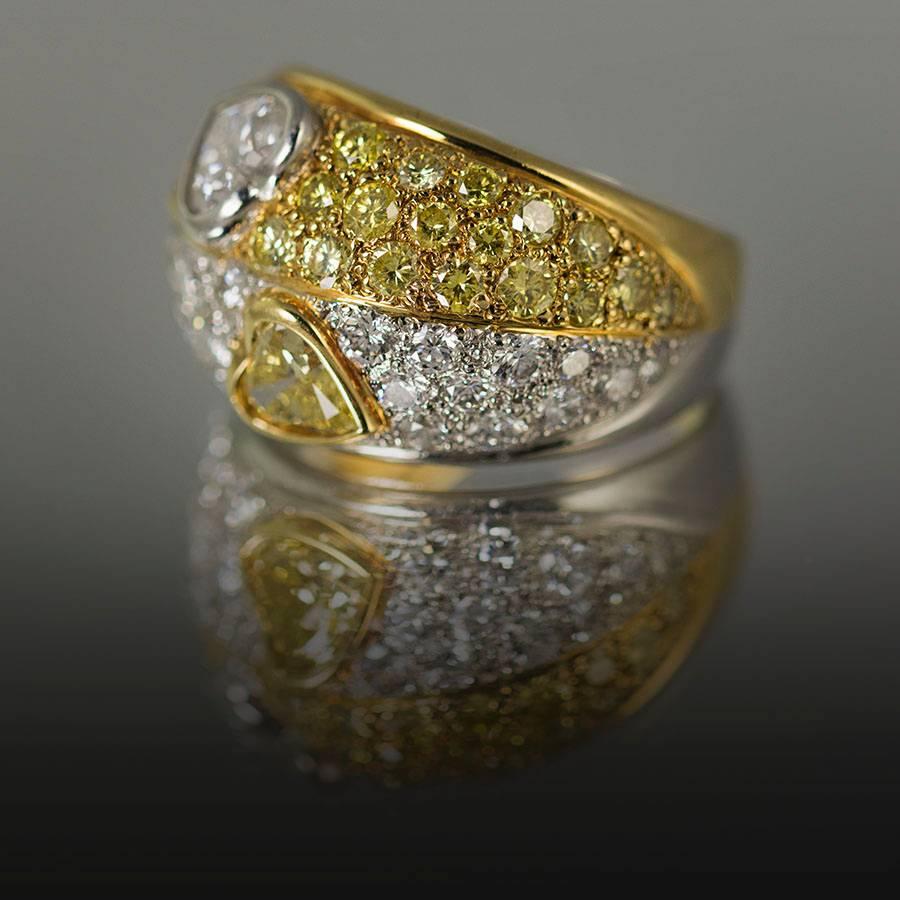 Modern Intense Yellow Diamond Gold Platinum Ring For Sale