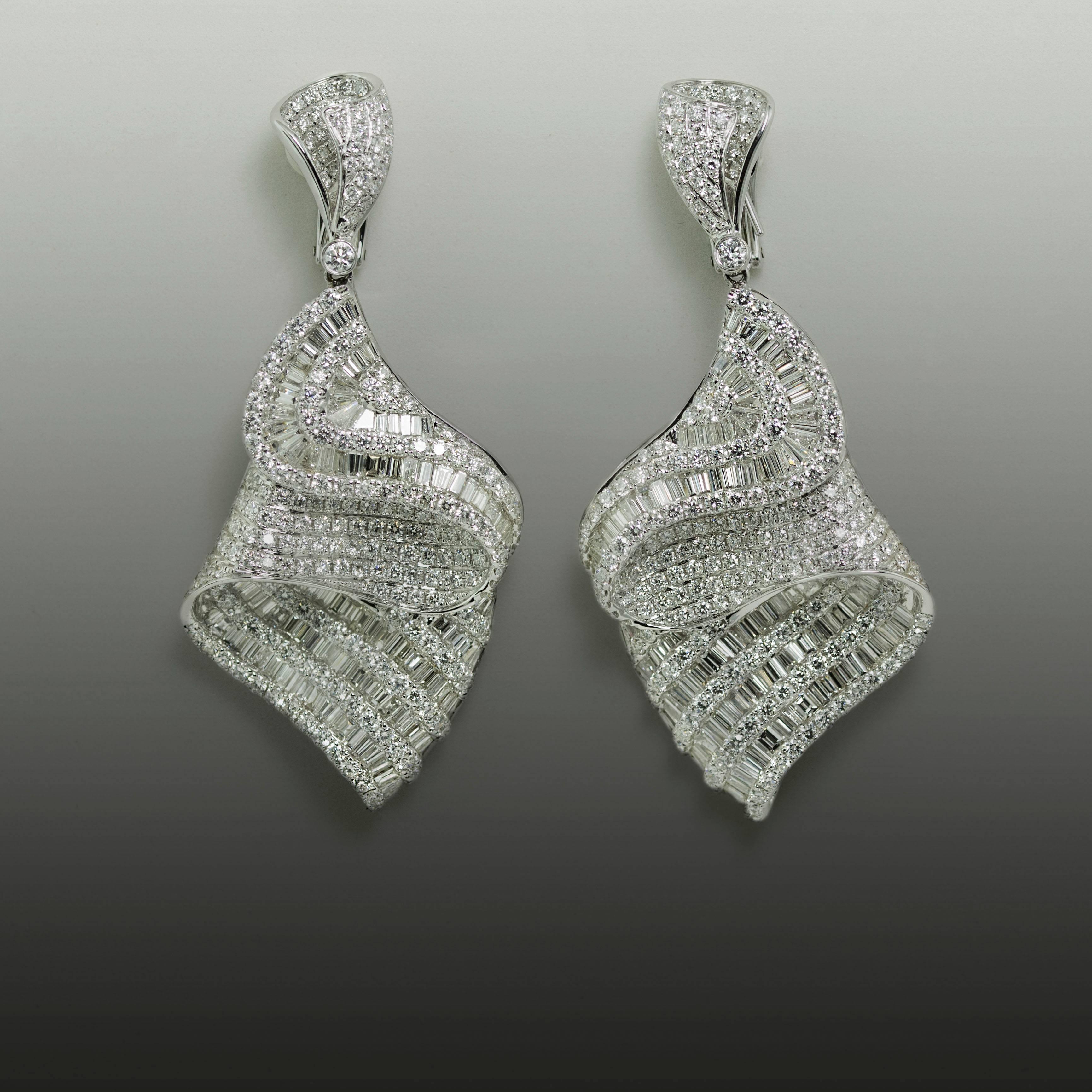Academy Award Style 18k white gold chandelier earrings with 17.83 carats of F-G color VS+ clarity baguette cut and round brilliant diamonds.