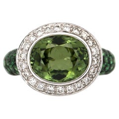 Anillo «halo» de oro blanco de 18 quilates con turmalina verde y diamantes, talla 7 (EE. UU.)