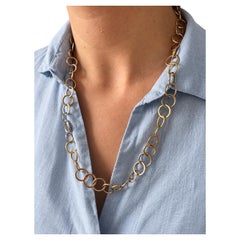 Pomellato tri-colour gold Lucciolo set including a chain necklace and bracelet
