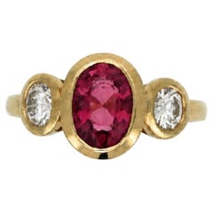 18kt yellow gold Rubellite tourmaline and Diamond three stone ring