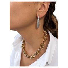 An Italian Vintage 18kt yellow gold red and white gold necklace.