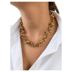 An Italian Vintage 18kt yellow gold red and white gold necklace.