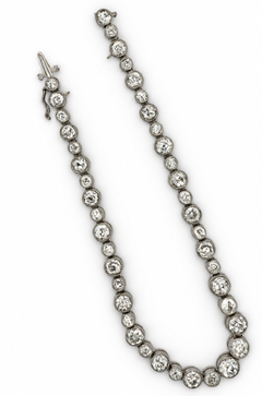 Platina Rivièra Art Deco Tennis bracelet with c. 6.00 ct. old mine cut diamonds.