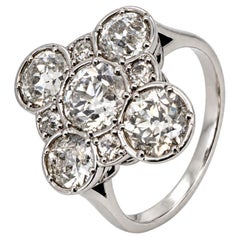 18k white gold diamond modern Artdeco style quatrefoil ring