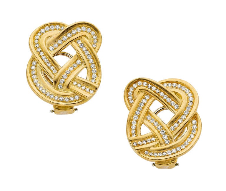 The earrings feature full and single-cut diamonds weighing a total of approximately 1.5 carats, set in 18k gold, completed by posts with omega backs.
Length - 1