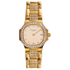 Patek Philippe Ladies Nautilus 4700/055J Cream Dial Pave Diamond Bezel