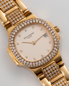 Patek Philippe Ladies Nautilus 4700/055J Cream Dial Pave Diamond Bezel