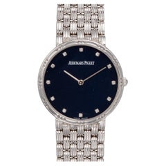 Audemars Piguet, cadran bleu mat serti de diamants, bracelet tressé, or blanc 18 carats, mouvement à quartz