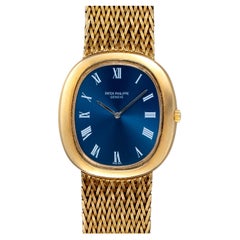 Patek Philippe Golden Ellipse 3589/1, blaues Zifferblatt mit römischen Ziffern und Sunburst-Finish, 18 Karat Gelbgold, Automatikwerk