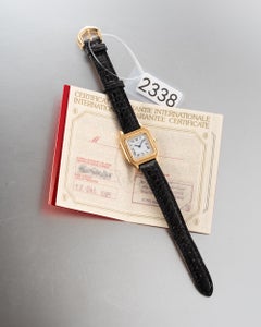 Cartier Mini Santos Dumont Extra Plate 96053, cadran « Paris », or jaune 18 carats, 1985, avec boîte et papiers