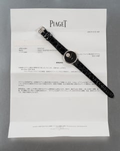 Piaget 9025 con escudo de armas, esfera de ónix, oro blanco de 18 quilates, década de los 80, con documentación de servicio