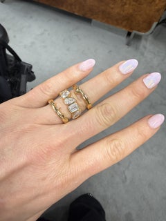 18k yellow gold 3 pc ring set with diamonds. 24.5g.